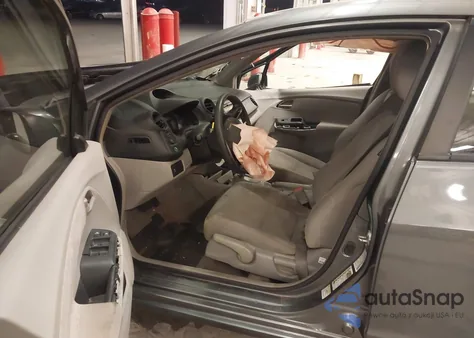 2011 Honda Insight z USA, uszkodzony, nr VIN JHMZE2H35BS004845